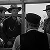 Lee Van Cleef, Ted Stanhope, Robert J. Wilke, and Sheb Wooley in High Noon (1952)