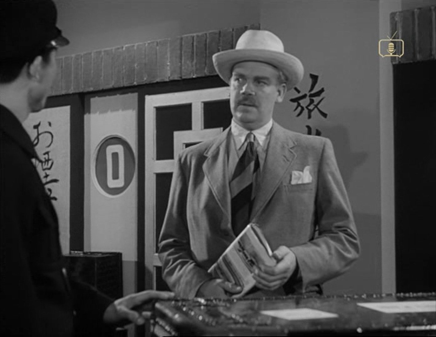 Peter Bathurst in Passenger to Tokyo (1954)