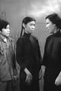 Sha-Fei Ouyang, David Da-Wei Chiang, and Josephine Siao in Wan li xun qing ji (1961)