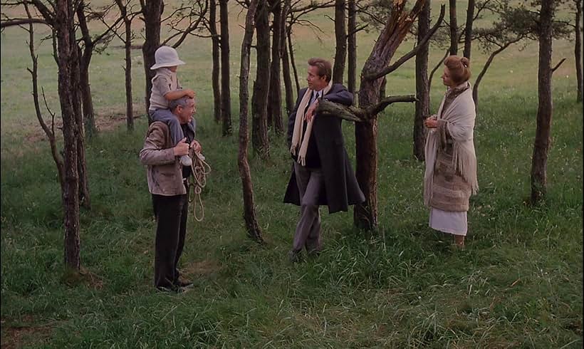 Susan Fleetwood, Erland Josephson, Tommy Kjellqvist, and Sven Wollter in The Sacrifice (1986)