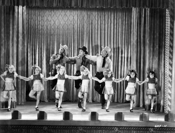 Ray Corrigan, Robert Livingston, Max Terhune, and The Meglin Kiddies in Roarin' Lead (1936)