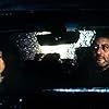 Jean Reno and Nadia Farès in Les rivières pourpres (2000)