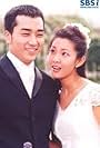 Kim Gyu-ri and Song Seung-heon in Popcorn (2000)