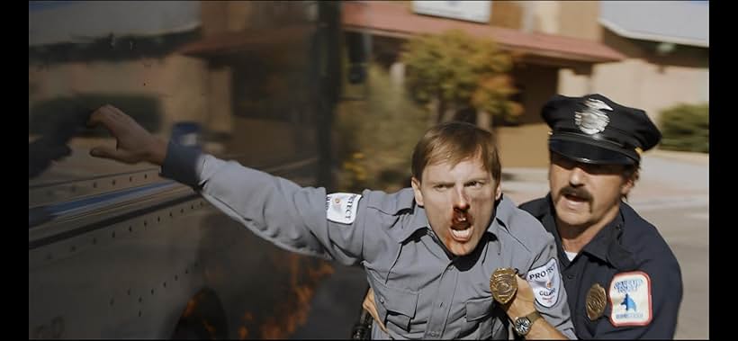 Still of Chris Silcox from the Opening Scene of Dark Winds - Chris Silcox playing the role of Bank Guard & Performing Stunts