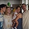 Luke Wilson, Andrea Savage, Lili Reinhart, and Danny Ramirez in Look Both Ways (2022)