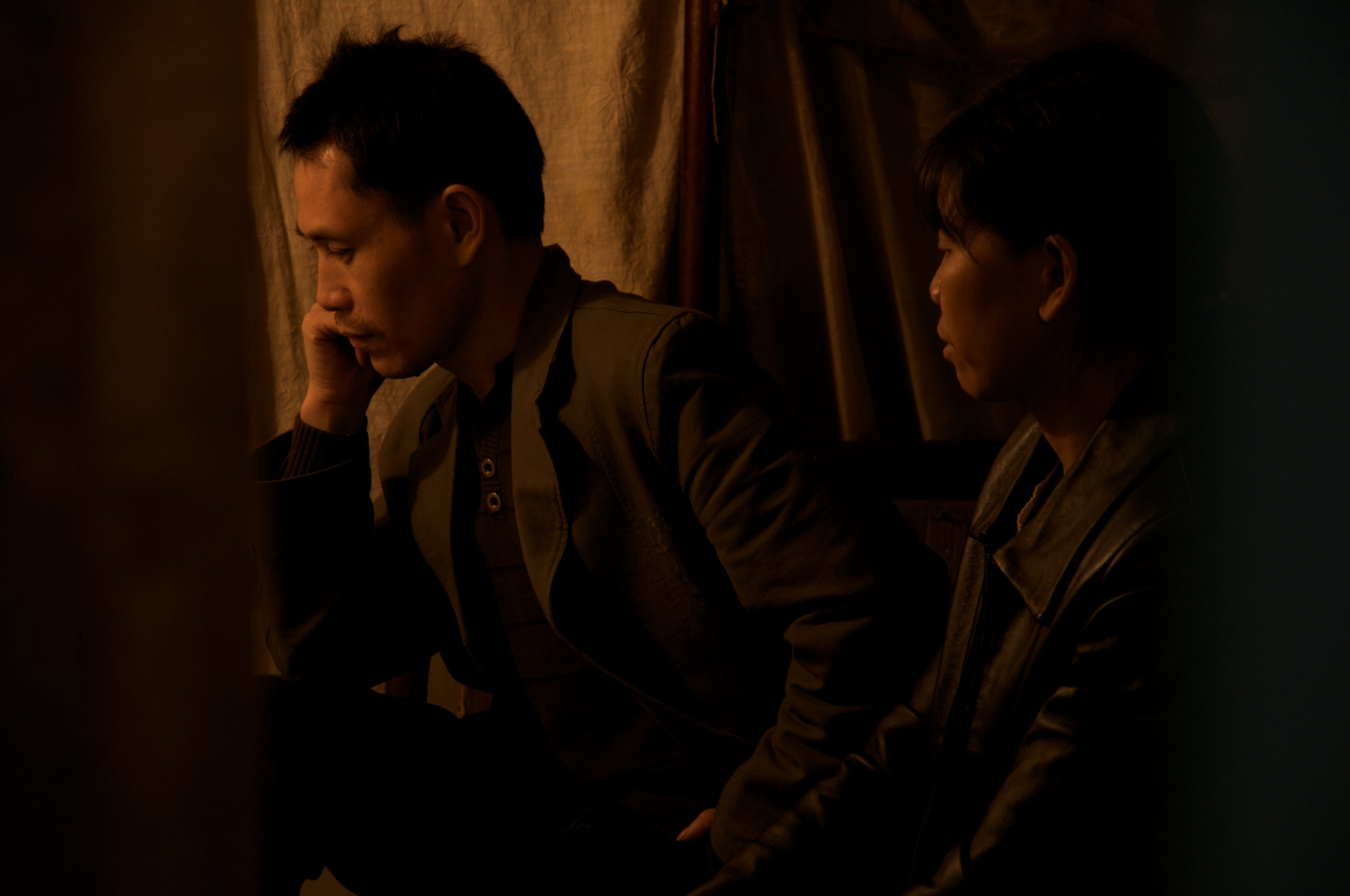 Changhua Zhang and Suqin Chen in Last Train Home (2009)