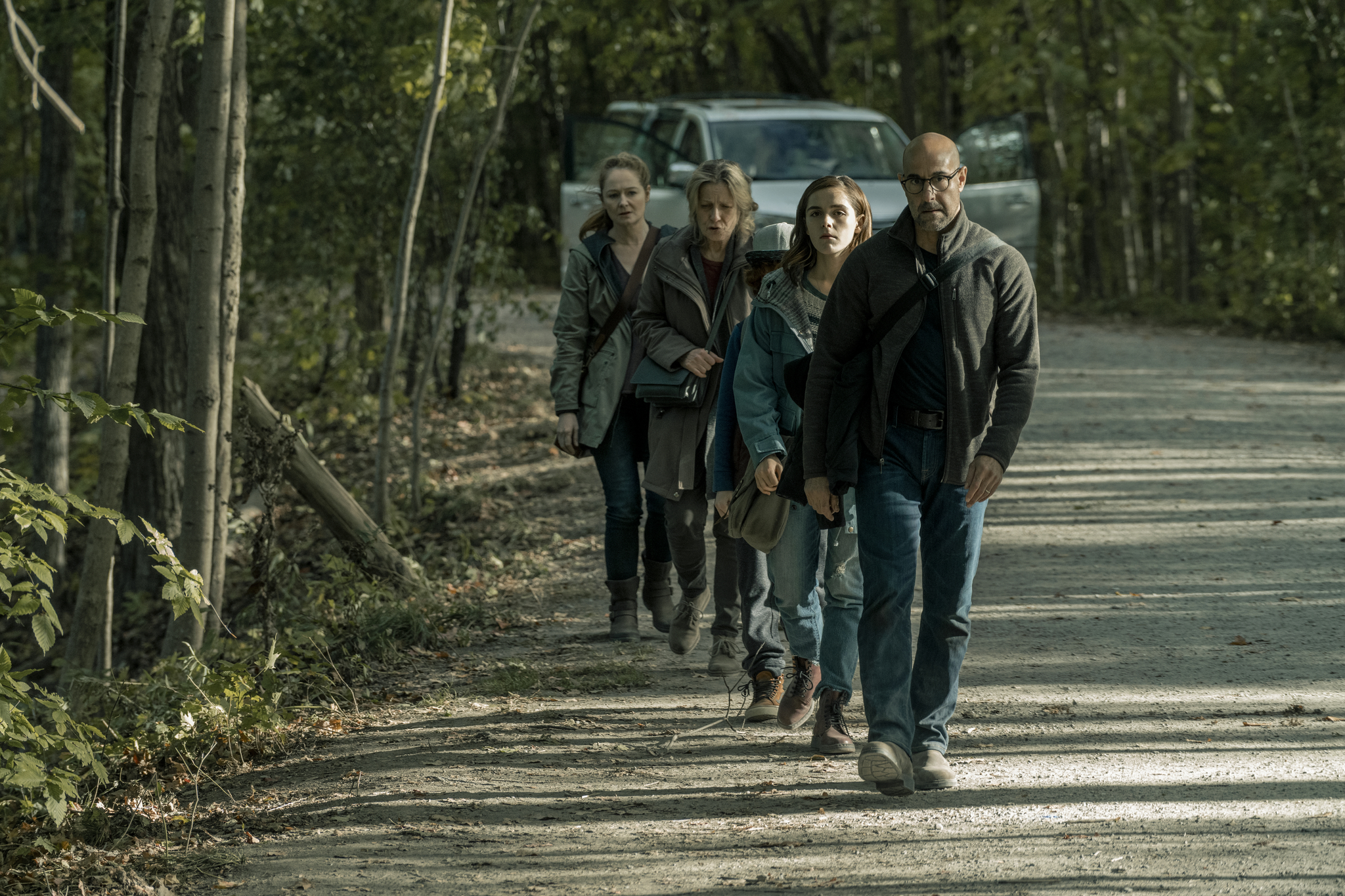 Miranda Otto, Stanley Tucci, Kate Trotter, and Kiernan Shipka in The Silence (2019)