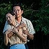 Steven Yeun and Han Ye-ri in Minari (2020)