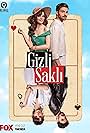 Halit Özgür Sari and Sinem Ünsal in Gizli Sakli (2022)