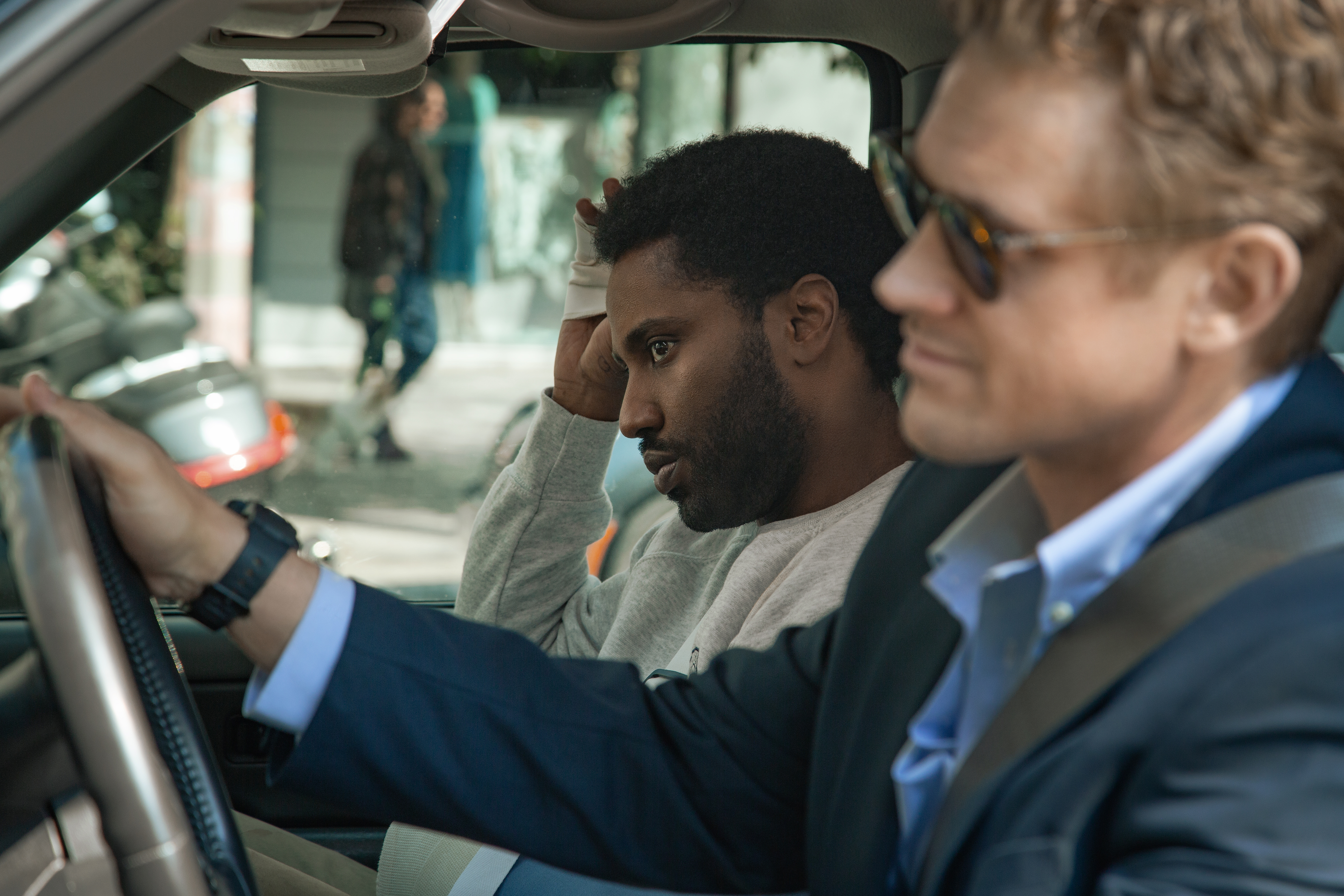 John David Washington and Boyd Holbrook in Beckett (2021)