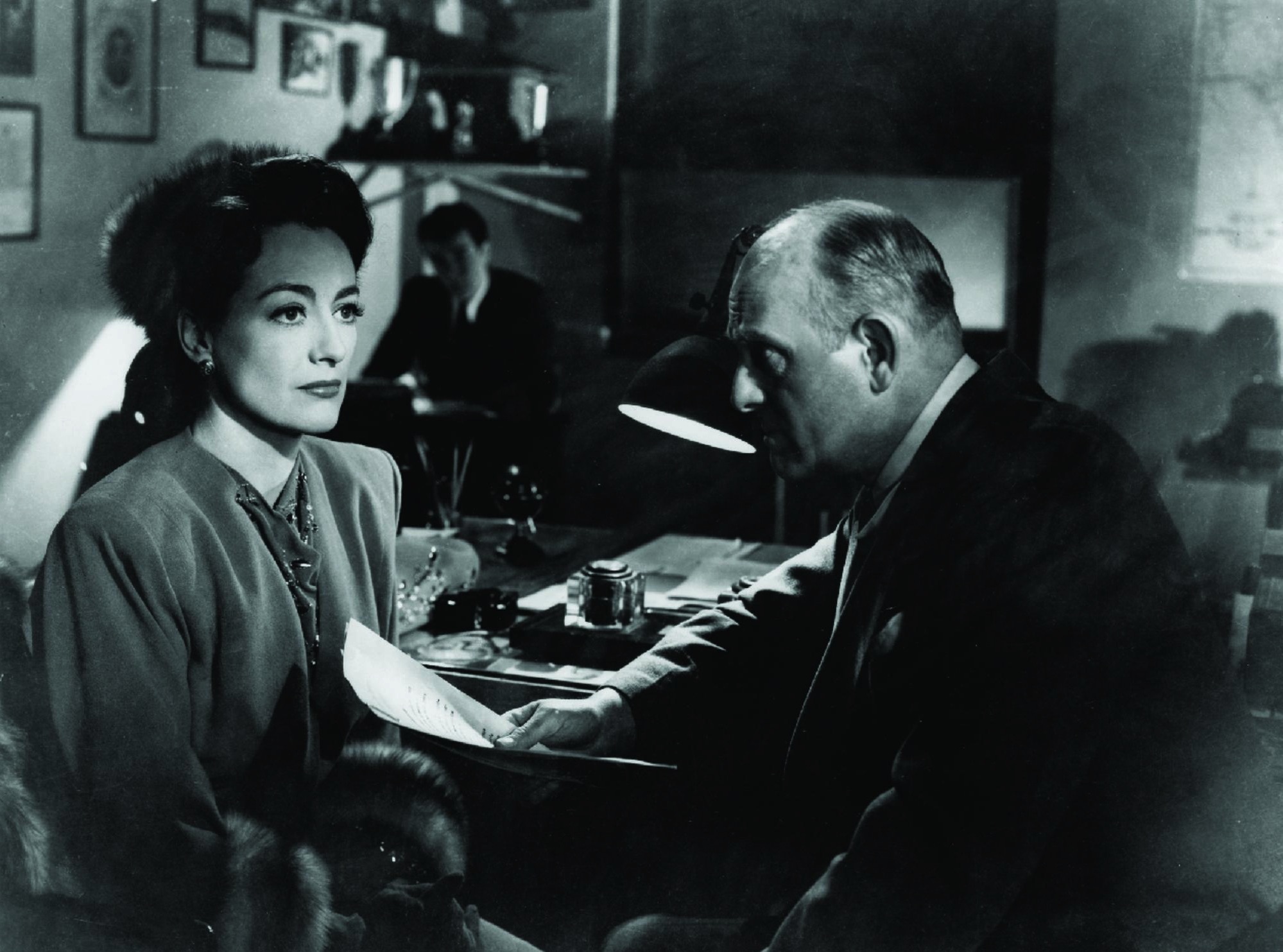 Joan Crawford and Moroni Olsen in Mildred Pierce (1945)