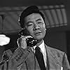 Victor Sen Yung in Woman on the Run (1950)