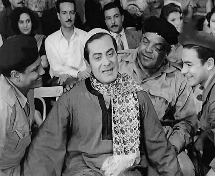 Farid El-Atrash and Ahmed Ramzy in Wadda'tu hubbak (1956)