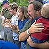 Richard Karn, Cynthia Stevenson, Kevin Zegers, Emma Marof, and Hannah Marof in Air Bud: Seventh Inning Fetch (2002)