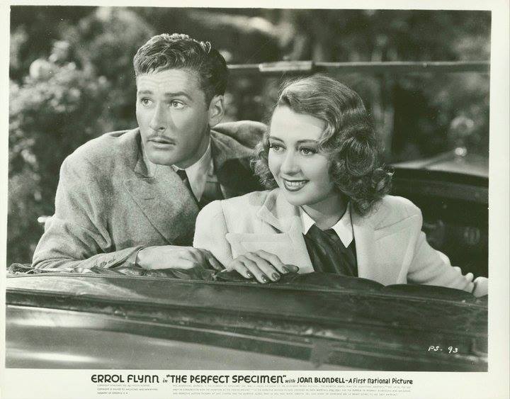 Joan Blondell and Errol Flynn in The Perfect Specimen (1937)