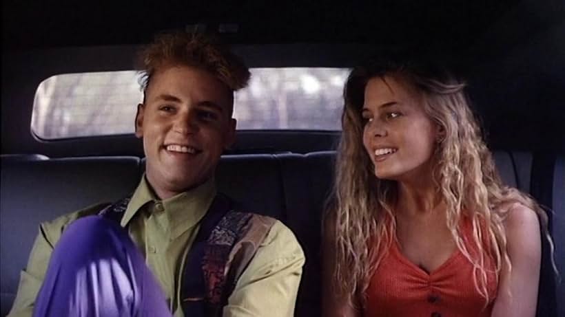 Corey Haim and Nicole Eggert in The Double 0 Kid (1992)