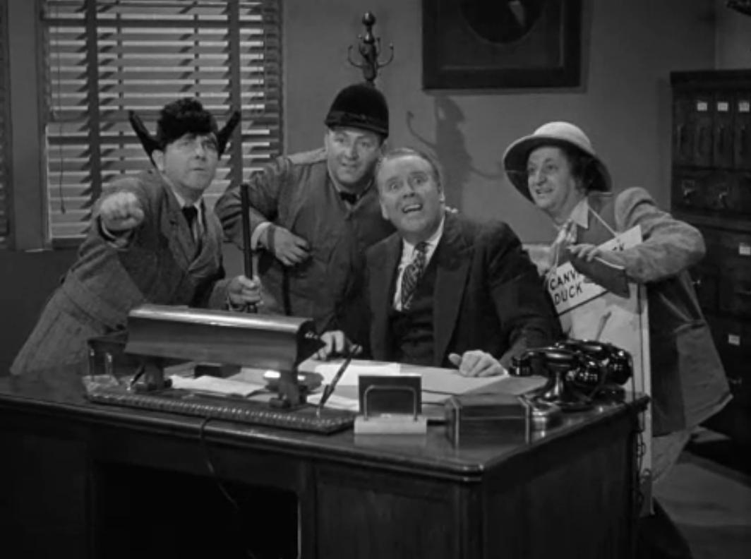 Moe Howard, Larry Fine, Curly Howard, and Bud Jamison in A Ducking They Did Go (1939)