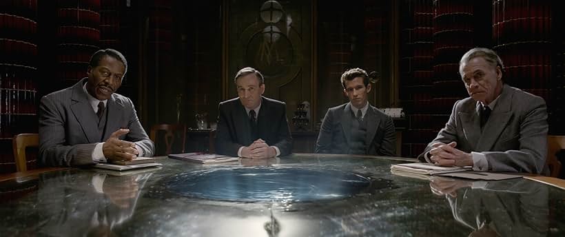 Cornell John, Derek Riddell, Wolf Roth, and Callum Turner in Fantastic Beasts: The Crimes of Grindelwald (2018)