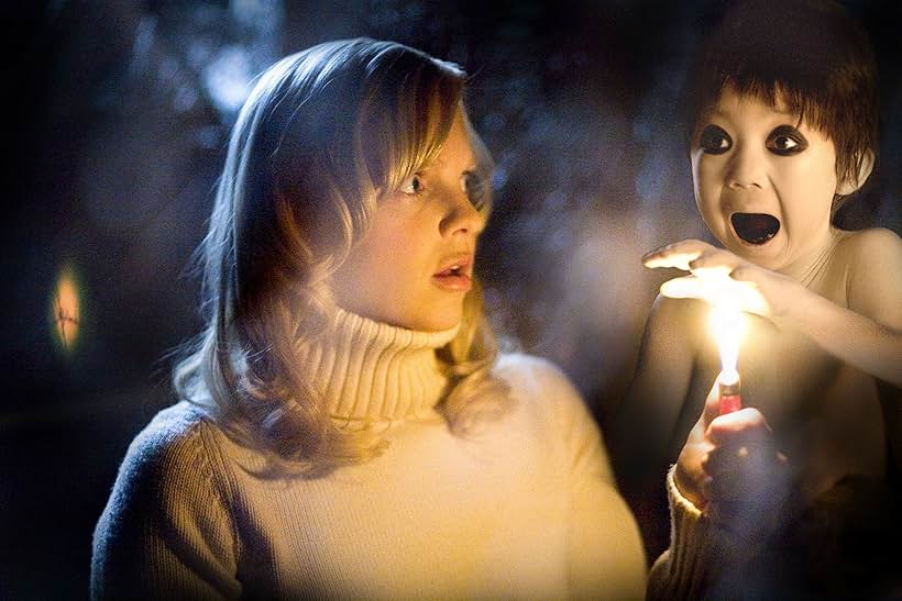 Anna Faris and Garrett Masuda in Scary Movie 4 (2006)