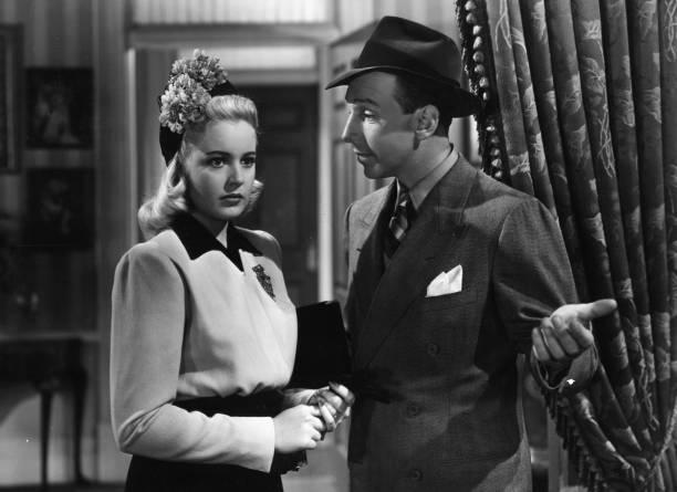 Mary Beth Hughes and Lloyd Nolan in Dressed to Kill (1941)