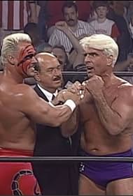 Steve Borden, Ric Flair, and Gene Okerlund in WCW Monday Nitro (1995)