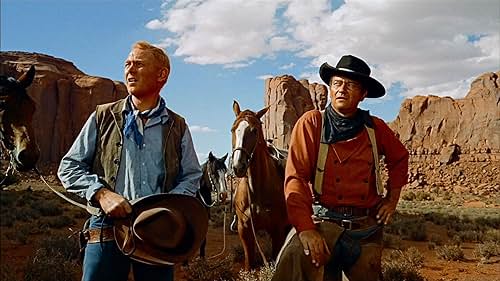 John Wayne and Harry Carey Jr. in The Searchers (1956)