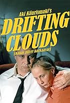 Kati Outinen and Kari Väänänen in Drifting Clouds (1996)