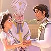 Alan Dale, Mandy Moore, and Zachary Levi in Tangled Ever After (2012)