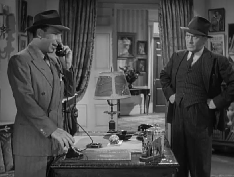 William Demarest and Lloyd Nolan in Dressed to Kill (1941)