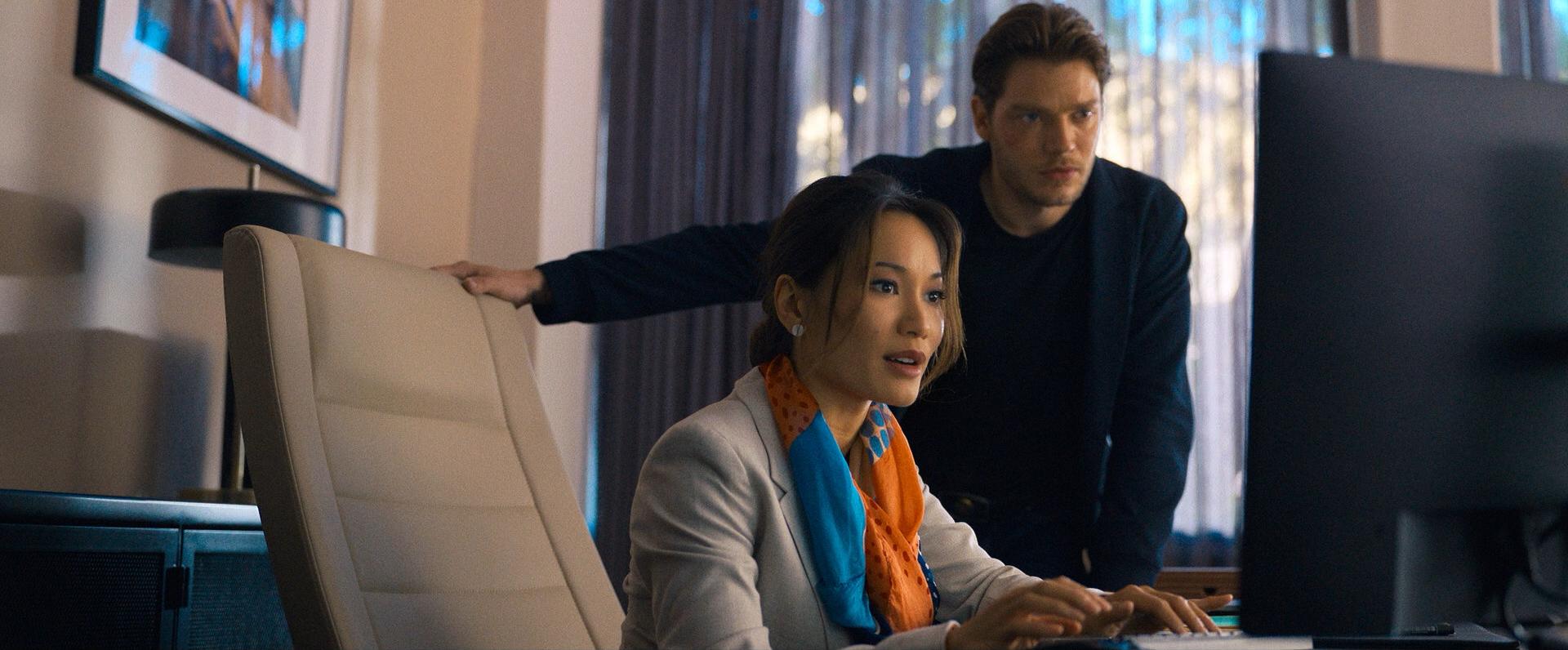 Dominic Sherwood and Jacky Lai in Eraser: Reborn (2022)