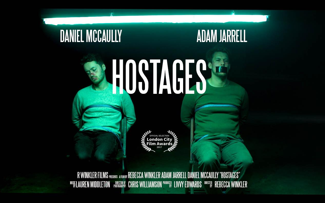 Adam Jarrell and Daniel McCaully in Hostages (2017)