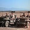 Lawrence P. Casey, Christopher George, Gary Raymond, and Justin Tarr in The Rat Patrol (1966)