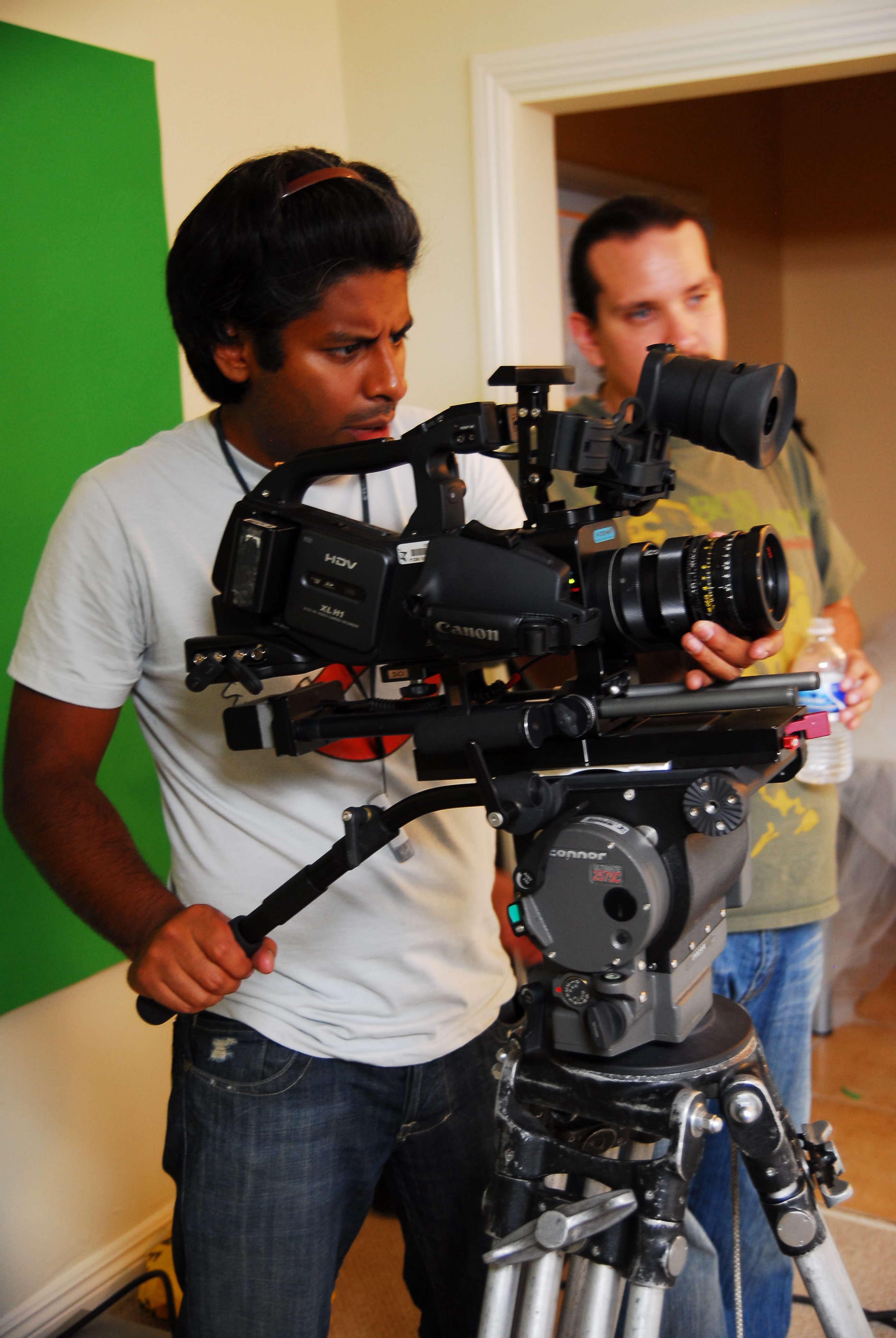 ROBERTO JIMENEZ, Director of Photography, frames up his next shot. 