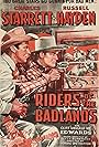 Russell Hayden and Charles Starrett in Riders of the Badlands (1941)