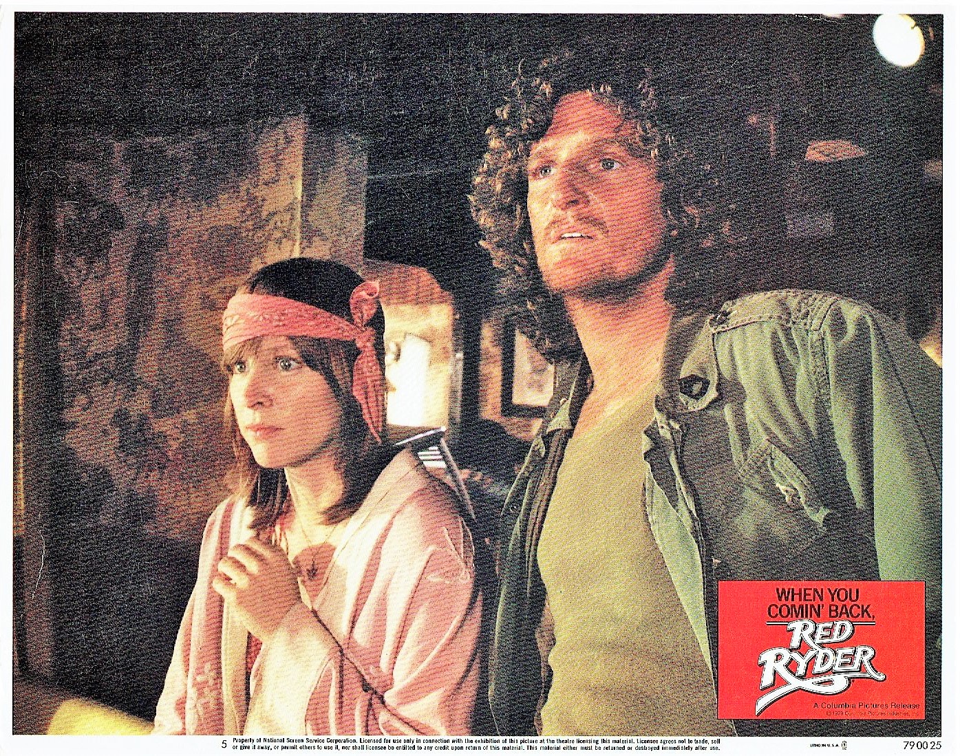 Candy Clark and Marjoe Gortner in When You Comin' Back, Red Ryder? (1979)