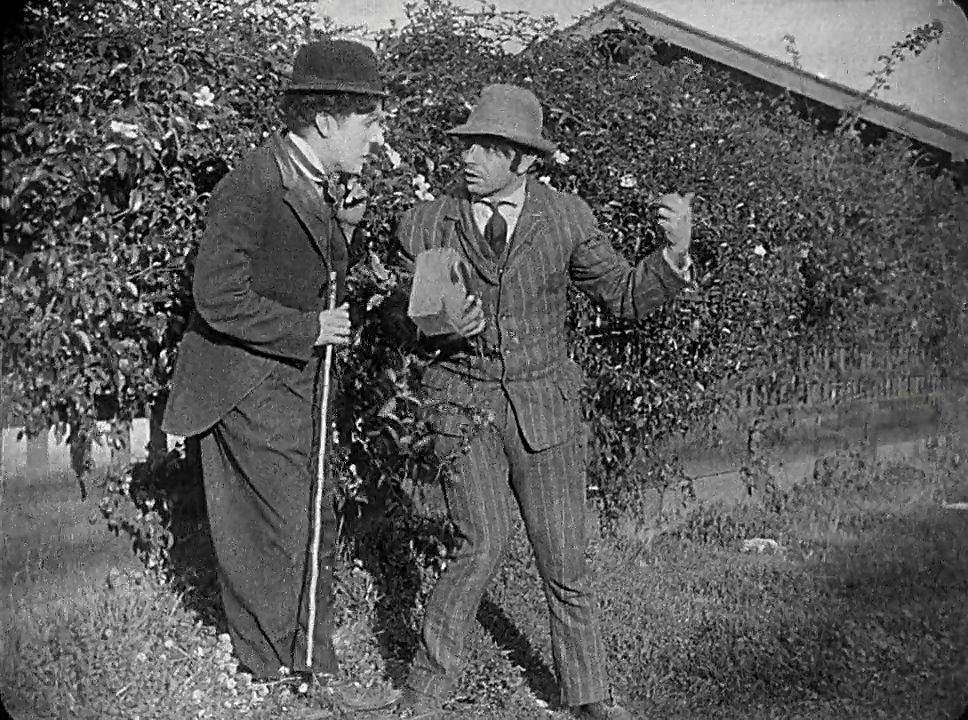 Charles Chaplin and Wesley Ruggles in Police (1916)