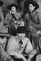 Joe Dominguez, Douglas Fowley, Rodolfo Hoyos Jr., and Hugh O'Brian in Le leggendarie imprese di Wyatt Earp (1955)