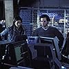 Jonny Lee Miller, Eion Bailey, Kathryn Morris, and Patricia Velasquez in Mindhunters (2004)