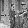 Charles Chaplin and Wesley Ruggles in Police (1916)