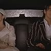 Takeshi Kaneshiro and Xun Zhou in Ru guo · Ai (2005)