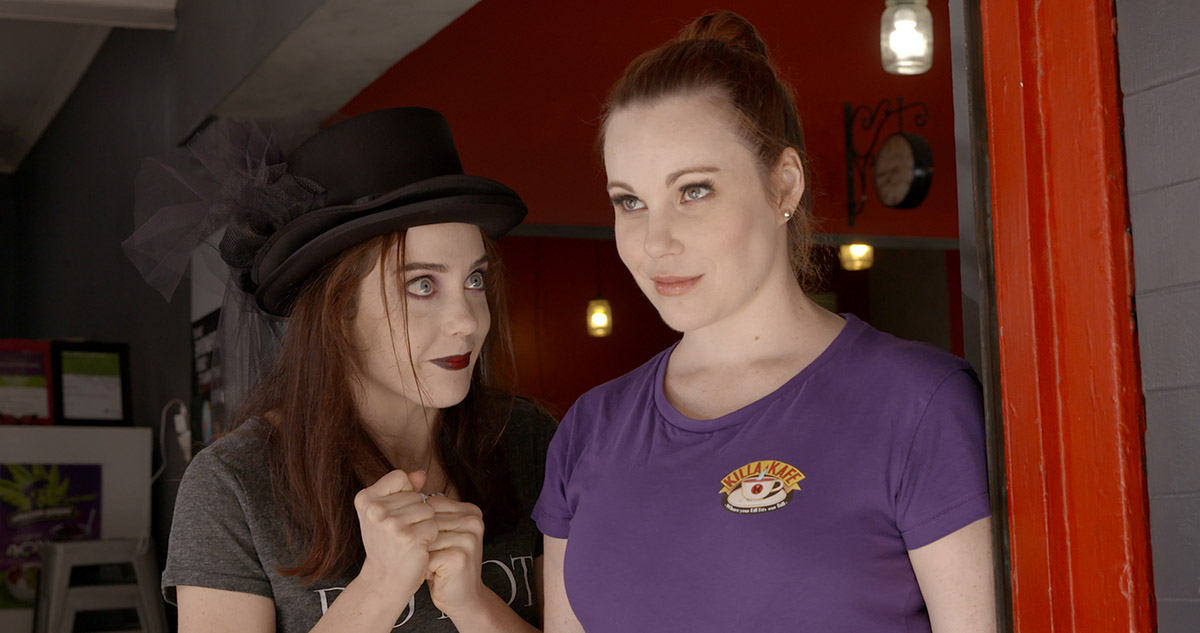 Tara Jay and Isabel Dickson in Killa Kafe (2019)