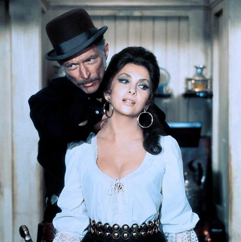 Lee Van Cleef and Gina Lollobrigida in Bad Man's River (1971)