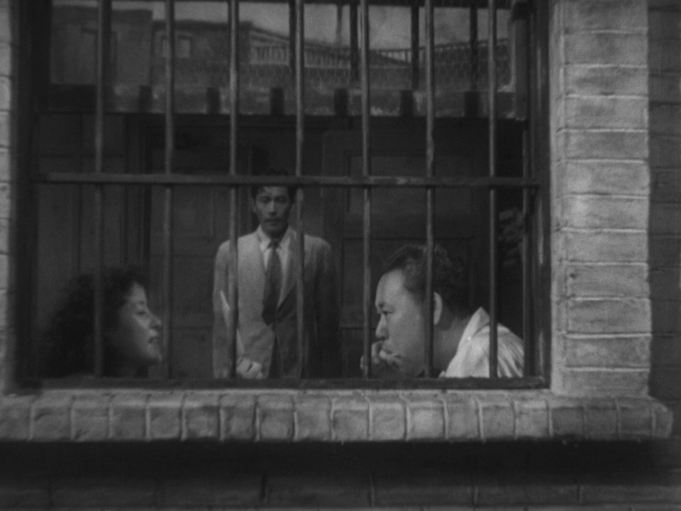 Toshirô Mifune, Noriko Sengoku, and Takashi Shimura in Stray Dog (1949)