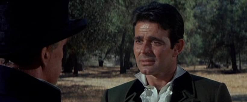 Henry Daniell and Stuart Whitman in The Comancheros (1961)