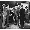 Jean Harlow, Emmett Corrigan, Jean Hersholt, Walter Huston, Tully Marshall, J. Carrol Naish, and Sandy Roth in The Beast of the City (1932)