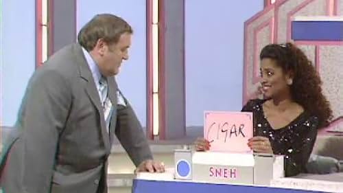 Les Dawson and Sneh Gupta in Blankety Blank (1978)