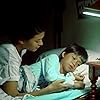 Sandy Andolong and Christopher Ng in Moral (1982)