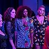 Busy Philipps, Renée Elise Goldsberry, Jonathan Hadary, Paula Pell, and Sara Bareilles in Girls5eva (2021)