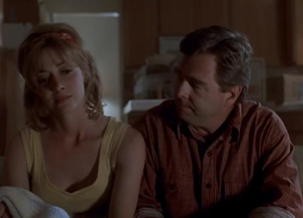 Beau Bridges and Sharon Lawrence in The Uninvited (1996)