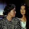 Ah-Lei Gua and May Chin in Xi yan (1993)